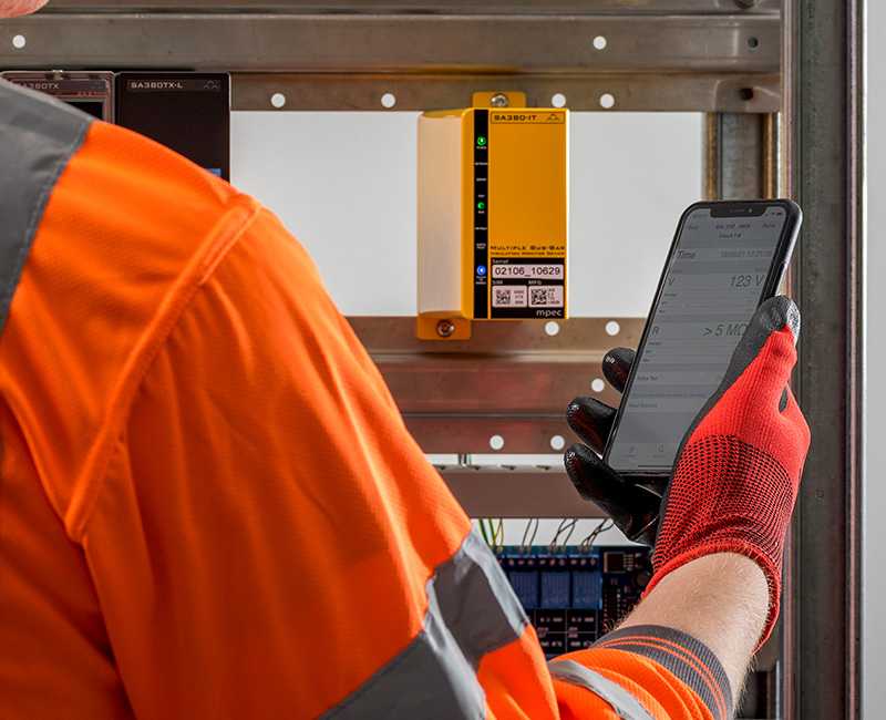 Man monitoring power supply of a system